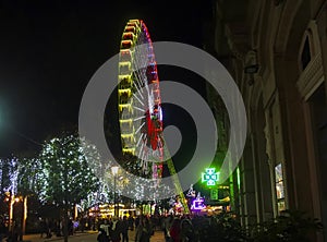 The great Christmas Ferris wheel in the city of Vigo, illuminated at night. Galicia, Spain.