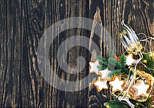 Star cookies Christmas lights decoration rustic wooden background