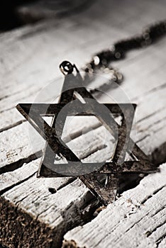 The star of david on a rustic wooden surface