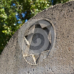 Star of David on the upper part of a gravestone in a Jewish cemetery