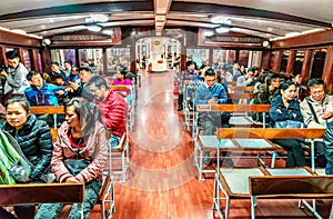 The Star Ferry passengers transported across Victoria Harbour in Hong Kong. People inside sail boat