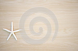 Star fish on wooden background
