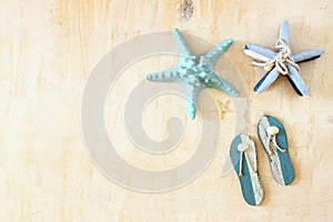 Star fish and wooden flip flops decoration.