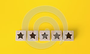 5 star rating blocks. Assessment of quality and service. Popularity. Reputation, feedback. Inspection, review. Shopping guide. photo