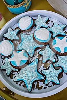 Star and seashell biscuit cookies, blue and white marzipan, marine thematic candy bar