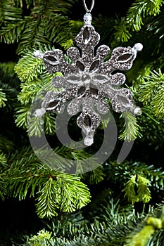 Star shape Christmas ornament in silver