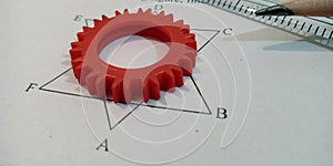 star shape geometric diagram displayed on white paper sheet with pencil pointer and scale