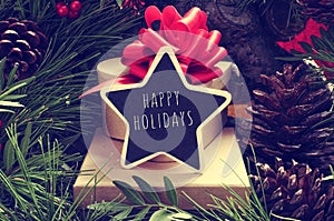 Star-shaped chalkboard with the text happy holidays