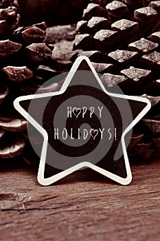 Star-shaped chalkboard with the text happy holidays