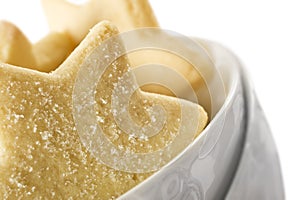 Star shaped cookies in a white bowl