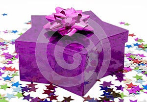 Star shaped gift box with a pink rosette