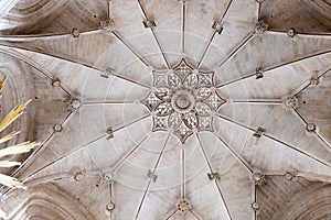Star-shaped vault on the roof of Burgos Cathedral with precious stone details. photo