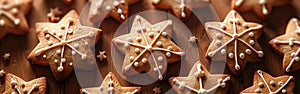 Star-Studded Christmas Treats: Closeup of Gingerbread Cookies with White Icing Decoration on Table