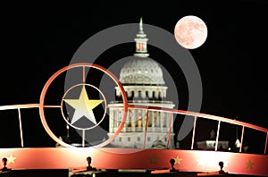 Star of Texas with the State Capitol Building at Night photo