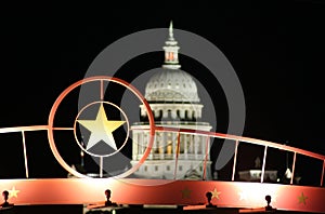 Star of Texas with the State Capitol Building at Night photo