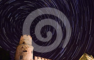 Star trail in the night sky at midnight