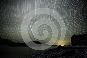 Star trails above an empty beach in Baja California Sur, Mexico