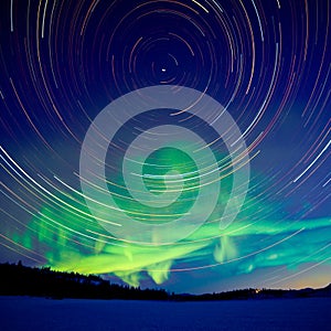 Star trails and Northern lights in night sky