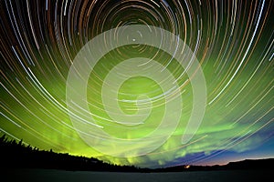 Star trails and Northern lights in night sky