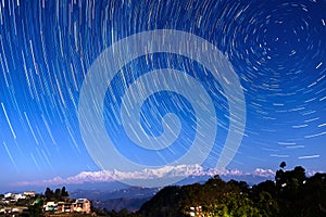 Star trails over Bandipur, Nepal photo