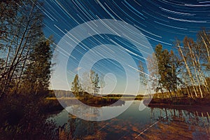 Star Trails Over Lake