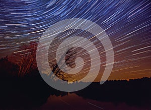 Star Trails Over Lake