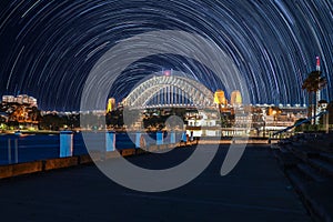 Star trails in the sky over Sydney Harbour NSW Australia startrails. lovely patterns and beautiful colours of the night.