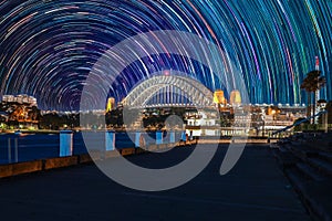 Star trails in the sky over Sydney Harbour NSW Australia startrails. lovely patterns and beautiful colours of the night.