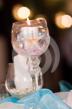 Starfish in candle at wedding