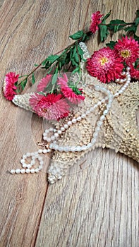 Starfish with flowers and pearls