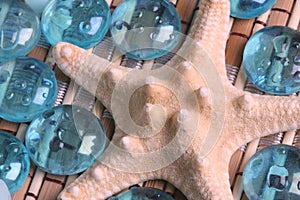 Starfish and glass pebbles