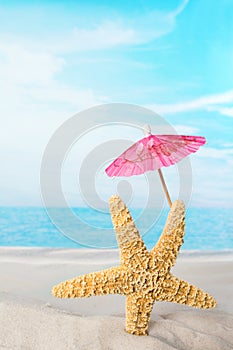 Starfish with pink parasol