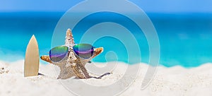 Starfish surfer on tropical beach