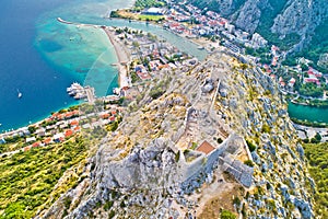 Starigrad Fortica fortress and Cetina river mouth in Omis aerial view