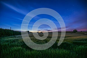 Starry night in farm fields with beautiful sky, Cornwall, UK