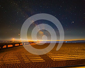 Starry night over Manhattan Beach shore