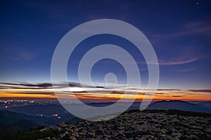 Starry sky before dawn in the mountains