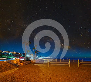 Starry sky over Hermosa Beach at night photo