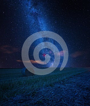 Starry sky over stubble field, fine art landscape