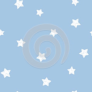 Starry sky seamless pattern. White stars on a blue background. Vector simple childish hand-drawn background in cartoon style.
