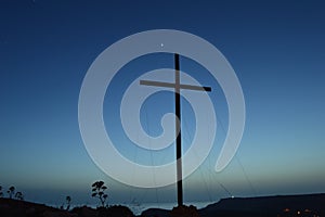 Stars in background of a cross