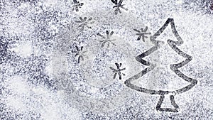 Stars and christmas tree drawing reveal in flour