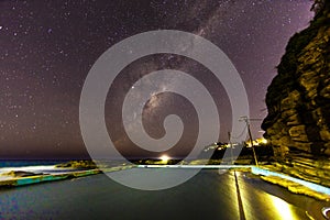 Stars at night above an ocean view house, Sydney, Australia