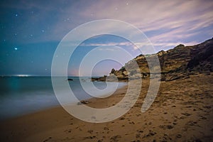 The stars in a perfect night in a beach