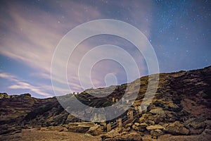 The stars in a perfect night in a beach