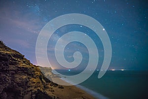 The stars in a perfect night in a beach