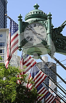 Stars and Stripes with company clock Chicago USA