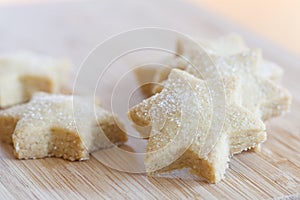 Starshaped Christmas cookies with sugar photo