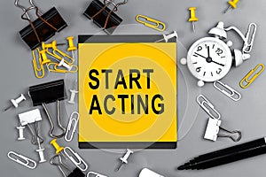 Start Acting - concept of text on sticky note. Work and study concept