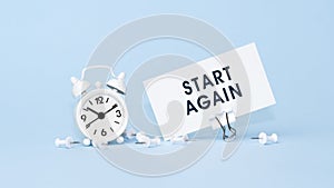 Start Again - concept of text on business card. Work and study concept